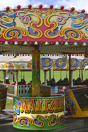 Waltzer and Dodgems, fairground rides on Epsom Downs photographed by pop artist Trevor Heath